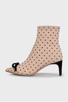 Beige ankle boots with bows