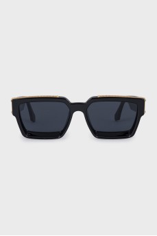 Sunglasses with the 1.1 Millionaires logo