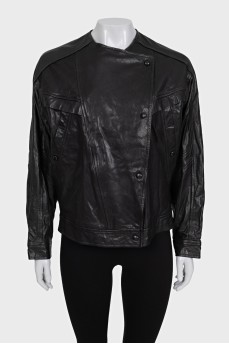 Leather jacket with buttons and tag