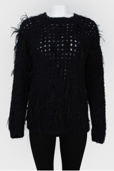 Knitted sweater with openwork top