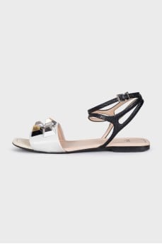 White sandals with rhinestones and studs
