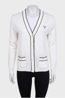 White cardigan with embroidered logo and seam accents