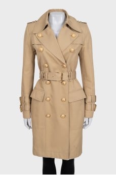 Fitted trench coat with gold buttons