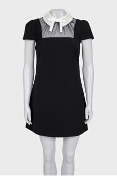 Black dress with a decorated collar