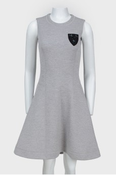 Sleeveless dress with a sun skirt