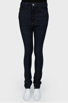 Skinny jeans with silver button