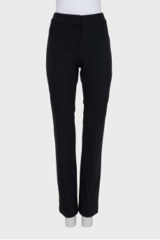 Straight black trousers with a mid-rise