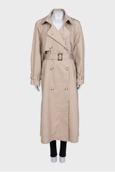 Trench coat with a buttoned belt