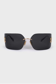 Wide sunglasses with gold logo