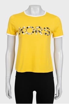 Yellow T-shirt with decorated logo