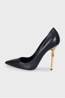 Black shoes with a curved heel