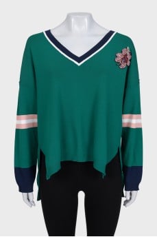 Oversized pullover decorated with crystals