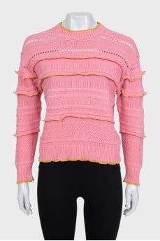 Pink jumper with perforations and accent seam