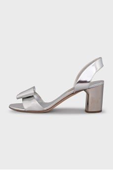 Silver leather sandals with a bow