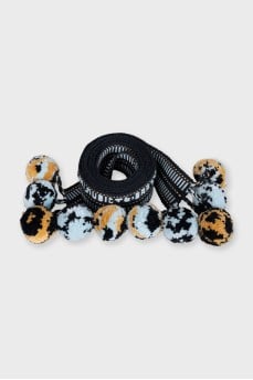 Textile belt with pom-poms