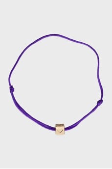 Adjustable bracelet with gold pendant