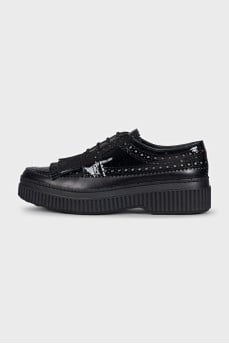 Black leather brogues