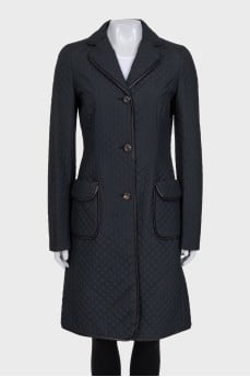 Black raincoat with patch pockets
