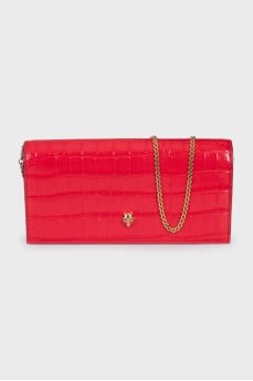 Leather clutch with embossed chain