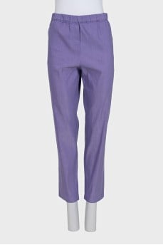 Tapered trousers with elastic waistband and pockets