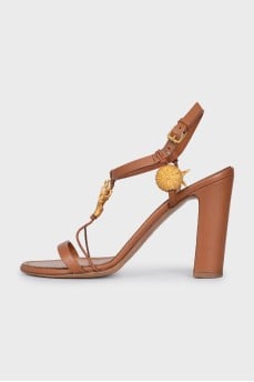 Leather heeled sandals with decoration