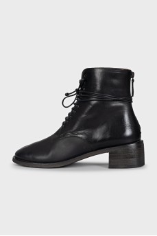 Black leather boots with heels