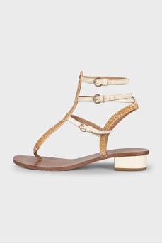 Sandals with decorated straps