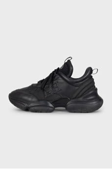 Black leather sneakers with shiny inserts