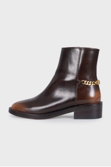 Brown leather boots with a zipper