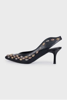 Black slingbacks with metallic decor