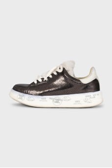 Brown sneakers with a fur tongue