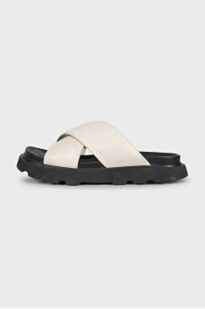 Beige leather flip-flops