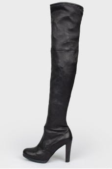 Black leather boots in heels
