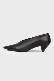 Black leather shoes with a sharp toe