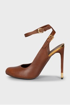 Brown slingbacks with gold hardware