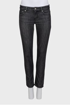 Skinny jeans with metallic detailing on the pocket