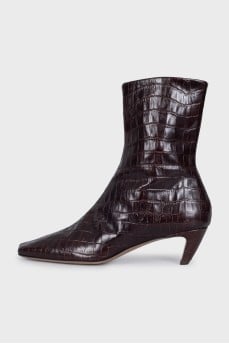Leather ankle boots with embossed heels