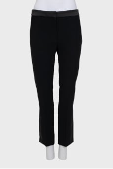 Black trousers with satin inserts on the sides