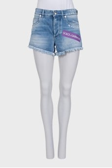 Blue denim shorts with logo