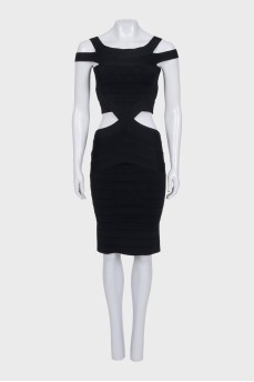 A fitted dress with side cutouts