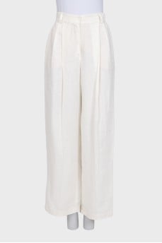 Wide-leg white linen trousers