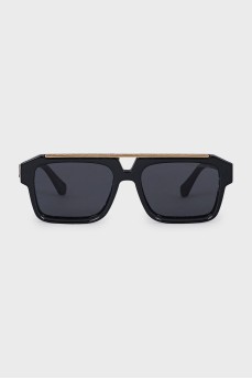 Black sunglasses with gold accents