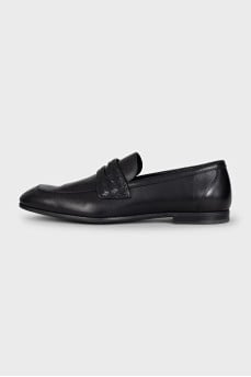 Men's black loafers with a weave element