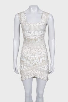 Cocktail dress with cutout waist and tag