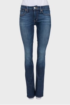 Flared jeans with a distressed effect