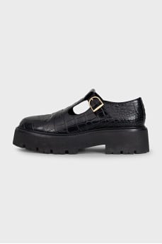 Black embossed leather shoes