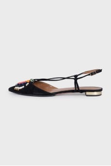 Suede slingbacks with a decorated toe