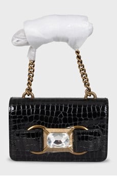 Black mini bag with decorative tag