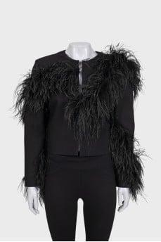 Black cropped jacket decorated with feathers
