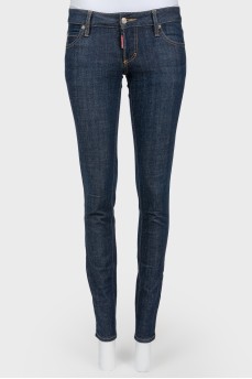 Dark-blue jeans narrowed on low landing